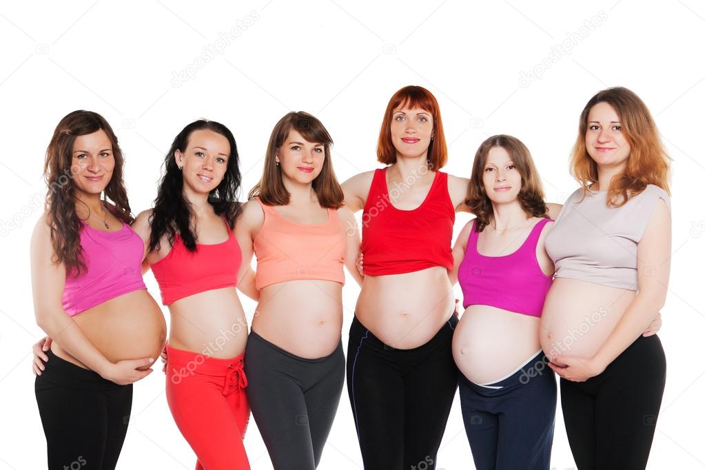 group of pregnant smiling happy woman standing and embracing. isolated on white background