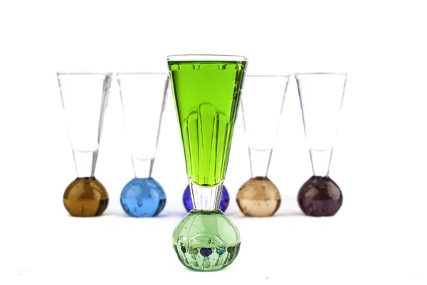 Shot Glasses with colored shot in front — Stock Photo, Image