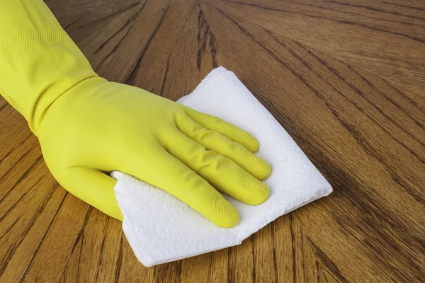 Gloved hand with paper towel — Stock Photo, Image