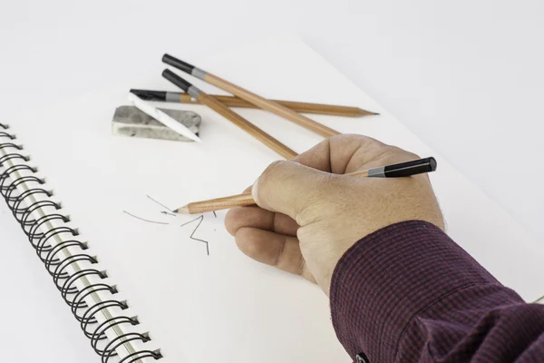 Man drawing on paper — Stock Photo, Image