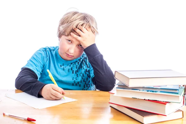 Chico haciendo tarea Imágenes de stock libres de derechos