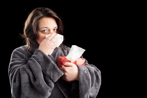 Femme malade sur fond noir Photo De Stock