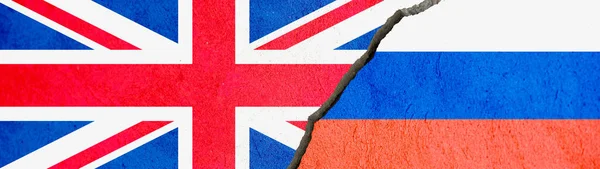 Флаг России Великобритании Треснувшей Стене Концепция Разделительного Конфронтационного Баннера — стоковое фото