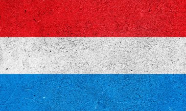 Flag of the Grand Duchy of Luxembourg on a cement plaster wall
