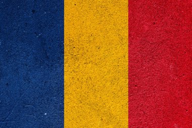 State flag of the Republic of Chade on a plaster wall