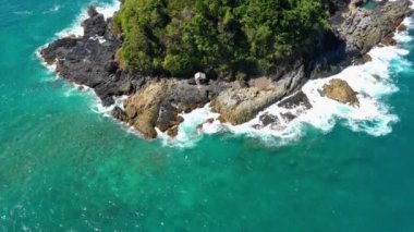 Aerial view with a drone over a cliff in El Nido, Philipplnes. Beautiful landscape in paradise, perfect for travel in nature under the sun 4K
