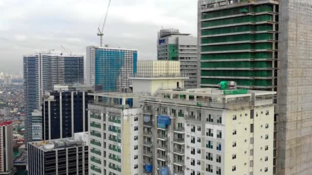 Manila Fülöp Szigetek Fővárosában Épít Felhőkarcolók Egy Nagyvárosban Légi Közeli — Stock videók