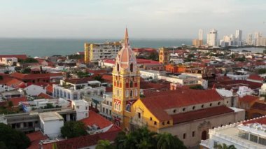 Aerial view at golden hour of beautiful cartagena city by the sea.