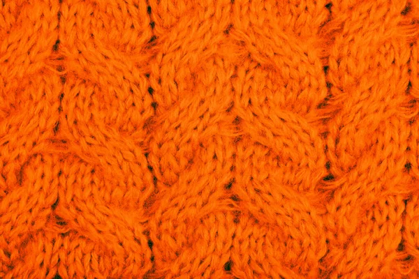 Przytulne Tło Pomarańczowej Dzianiny Tekstury Kablami Plecionkami — Zdjęcie stockowe