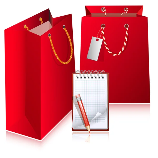 Rode tassen met laptop. — Stockvector