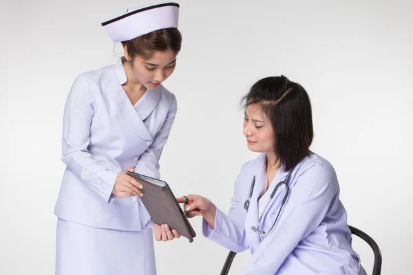 Médico e enfermeira — Fotografia de Stock