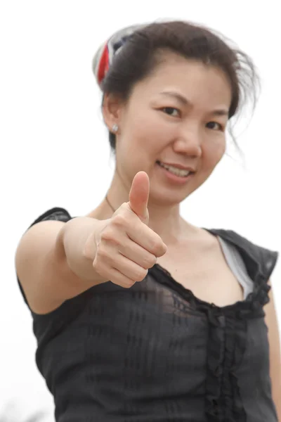 Mulher mostrando polegar — Fotografia de Stock
