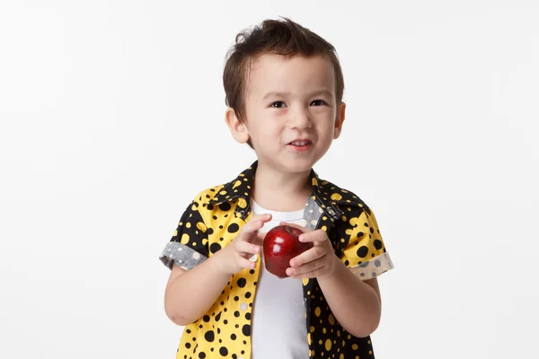 Junge und Apfel — Stockfoto