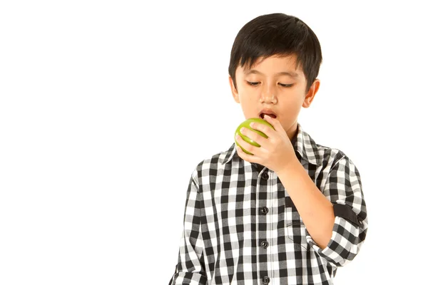 Ragazzo mangia mela — Foto Stock