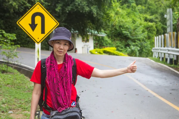 Hitchhiker women. — Stock Photo, Image