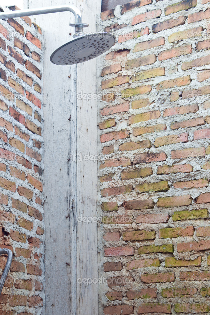 Shower on a brick wall — Stock Photo © tiverylucky 31287819
