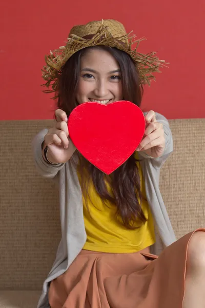 Woman and heart — Stock Photo, Image