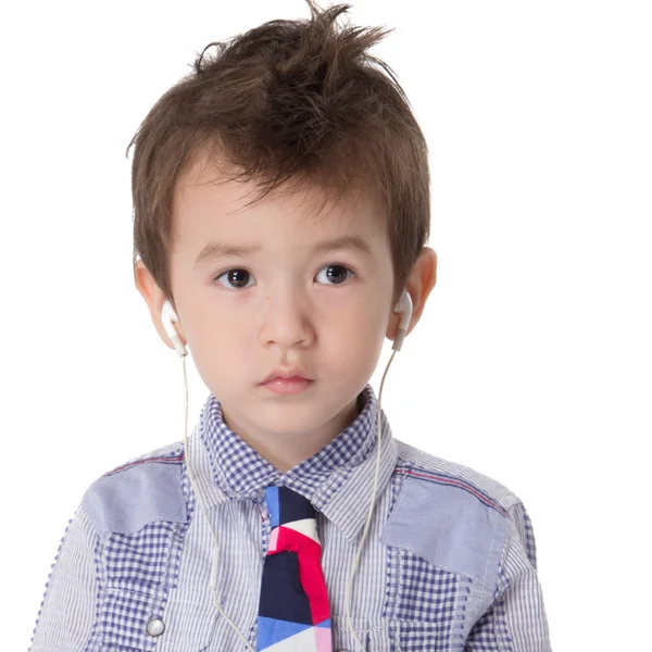 Niño con auriculares — Foto de Stock