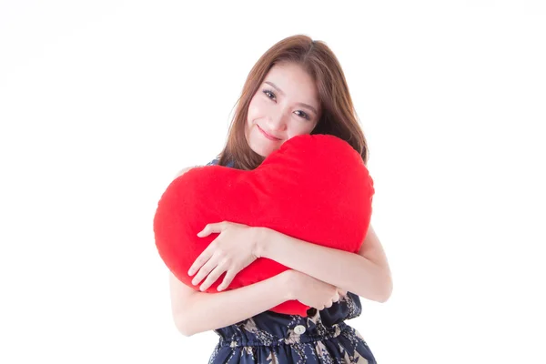 Asian woman holding a red heart — Stock Photo, Image