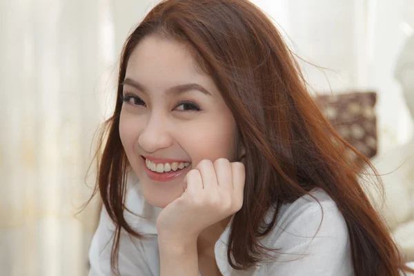 Asian woman in the bedroom. — Stock Photo, Image