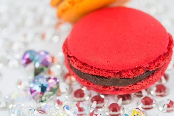Red macaroon on crystals — Stock Photo, Image