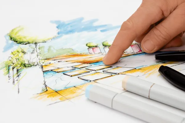 Landscape Architect showing Detail on Blueprint — Stock Photo, Image