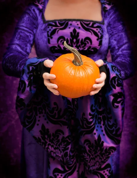 Holding Pumpkin