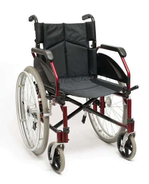 Інвалідний візок на білому — стокове фото