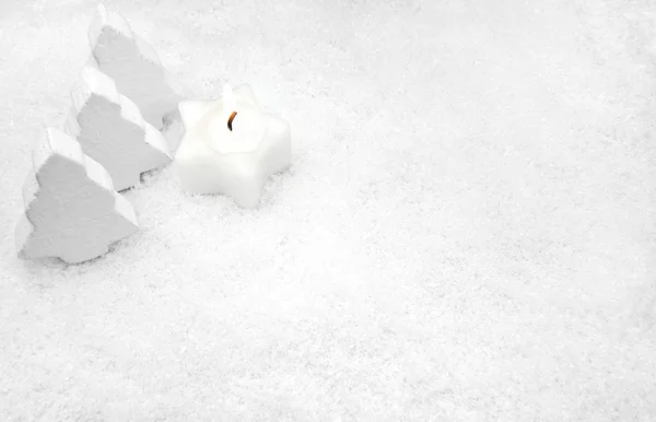 White candle in the snow — Stock Photo, Image