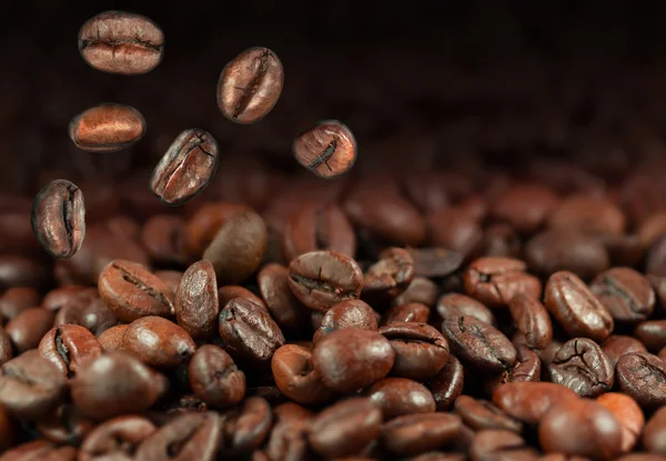 Falling coffee beans Stock Photo