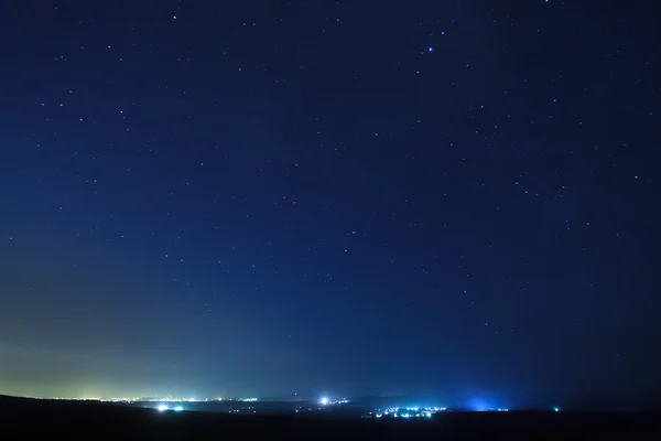 Stars over the city at night. Suburb. — Stock Photo, Image