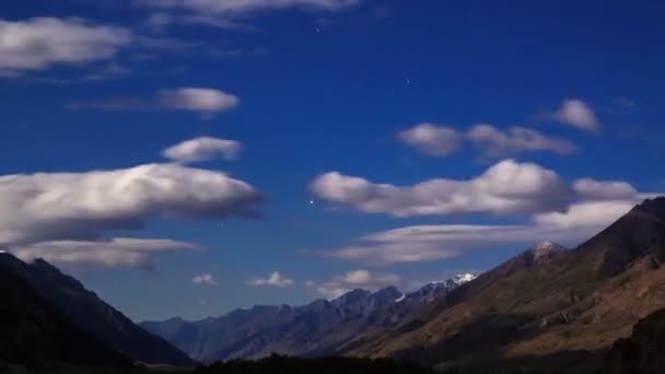 Moonlit night in the mountains. Time Lapse — Stock Video