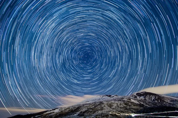 Stars tracks over the volcano Etna. Sicily, Italy — Stock Photo, Image