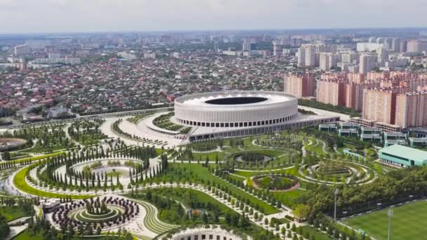 Dolly zoom. Krasnodar, Russia. Krasnodar - football stadium of the eponymous club in the city of Krasnodar. Public Park Krasnodar (Galitsky Park). Summer aerial view — Stock Video