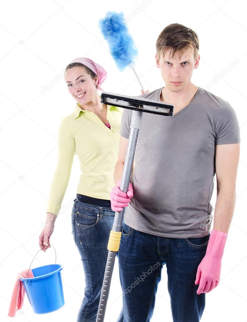 Man and woman cleaning the house