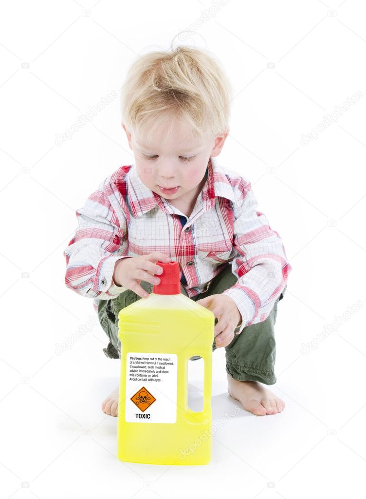 Child playing with cleaners