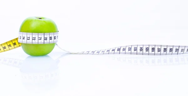 Conceito de maçã de saúde com fita métrica — Fotografia de Stock