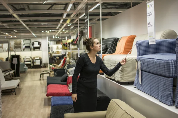 Woman shopping for furniture — Stock Photo, Image