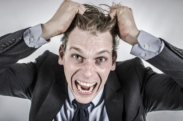 Businessman going crazy — Stock Photo, Image