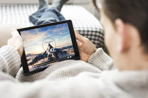 Watching movie on iPad — Stock Photo, Image