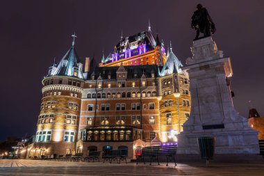 Quebec, Canada - October 18 2021 : Night view of the Quebec City Old Town Fairmont Le Chateau Frontenac in autumn. clipart