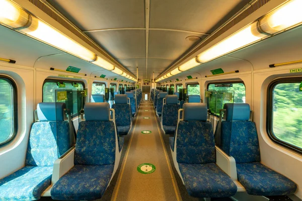 Toronto, ON, Canada - July 10 2021 : Interior of the GO Transit Go Train carriage during covid-19 pandemic period. Seat and acrylic divider.