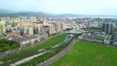 Taichung City, Taiwan - Aug 23, 2022 : Aerial view of Han River, Taichung city Beitun District buildings in sunset time.