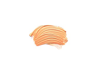 Beyaz arkaplanda izole edilmiş sıvı kremalı bir vakıf lekesi.