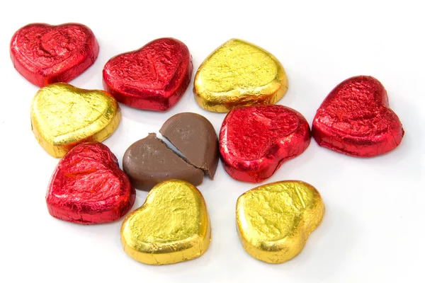 Chocolate hearts candies on white background — Stock Photo, Image