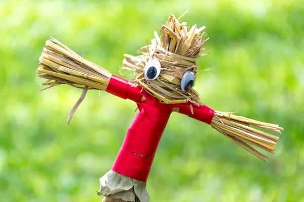 Scarecrow in garden — Stock Photo, Image