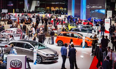 Vistors at the 86th International Geneva Motor Show in Palexpo, Geneva. the Geneva International Motor Show. Switzerland - March 1, 2016. clipart