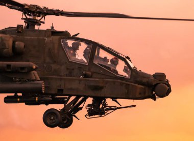 Boeing AH-64 Appache attack helicopter in flight during the Sanicole Sunset Air Show. Belgium - September 10, 2022 clipart