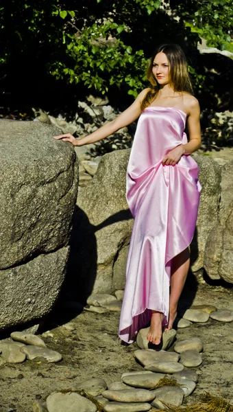 Girl in a pink dress — Stock Photo, Image