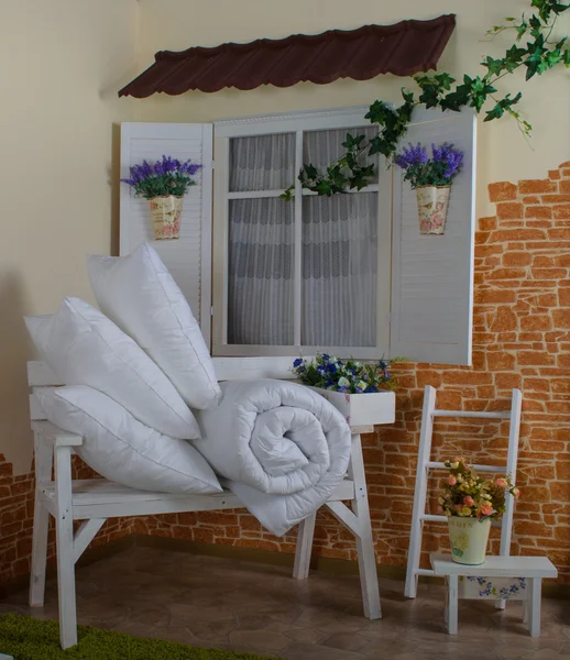 Mattress with a pillows on the bench — Stock Photo, Image